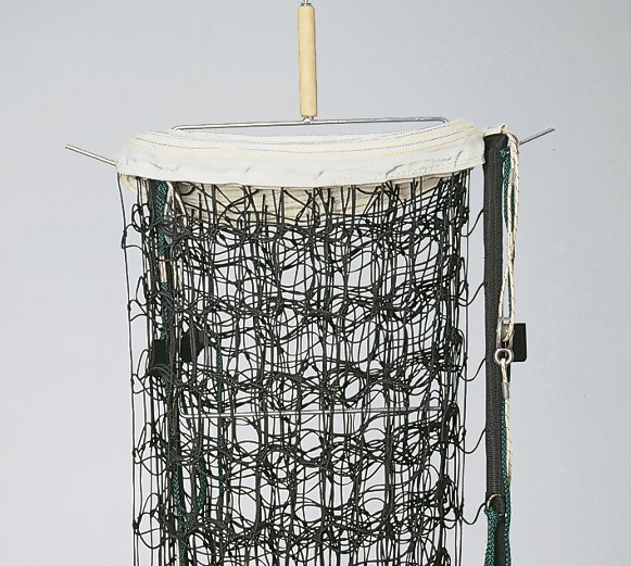 Net bracket for rolling up volleyball nets